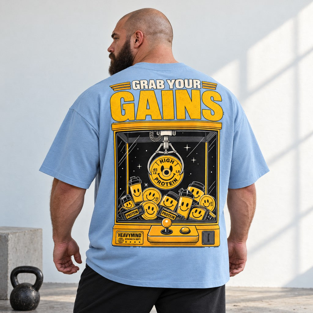 Grab Your Gains – Oversized Tee in Powder Blue, am Model, Rückansicht | Heavy Mind