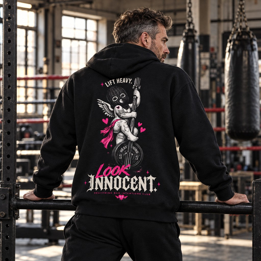 Lift Heavy, Look Innocent – Heavy Oversized Hoodie in Schwarz, am Model, Rückansicht | Heavy Mind